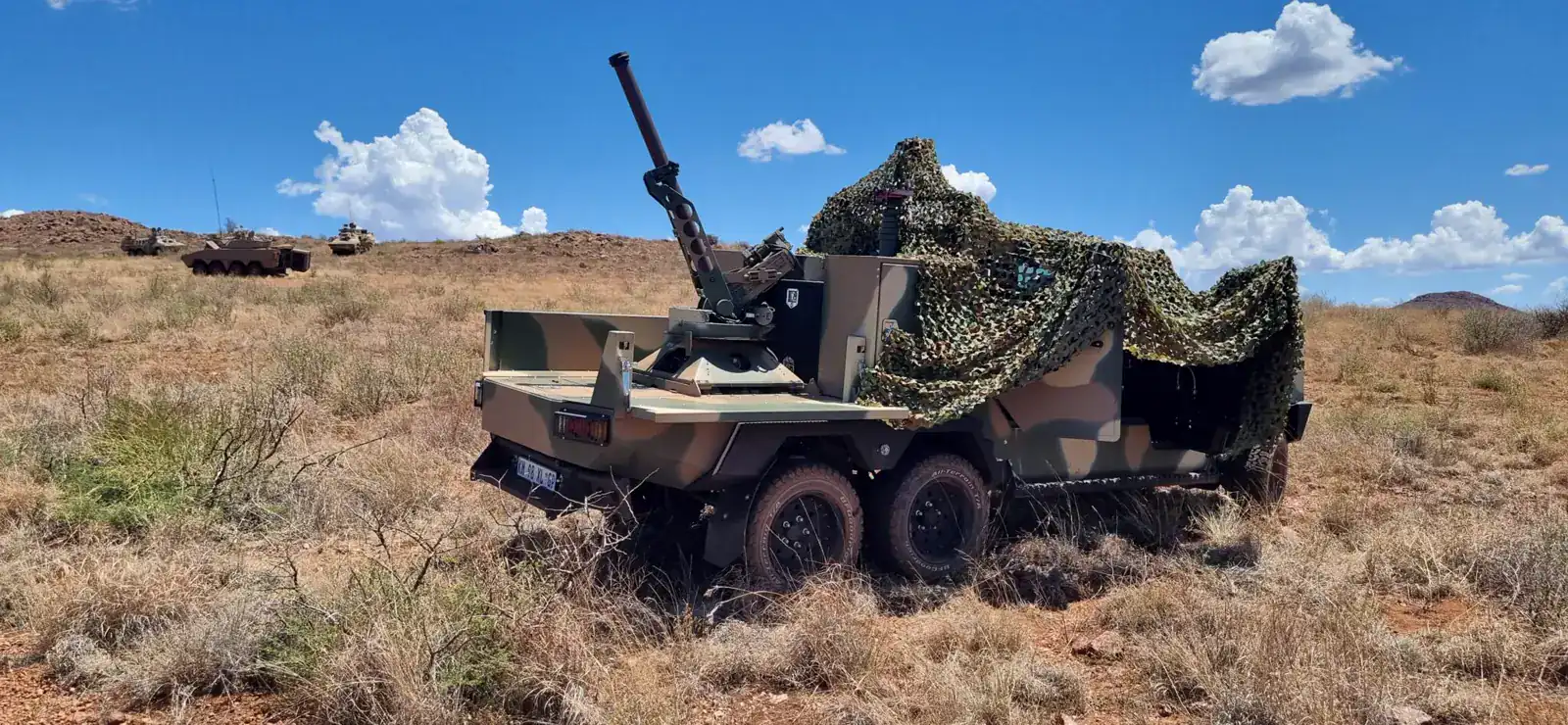 Scorpion automated mortar system mounted on a military vehicle